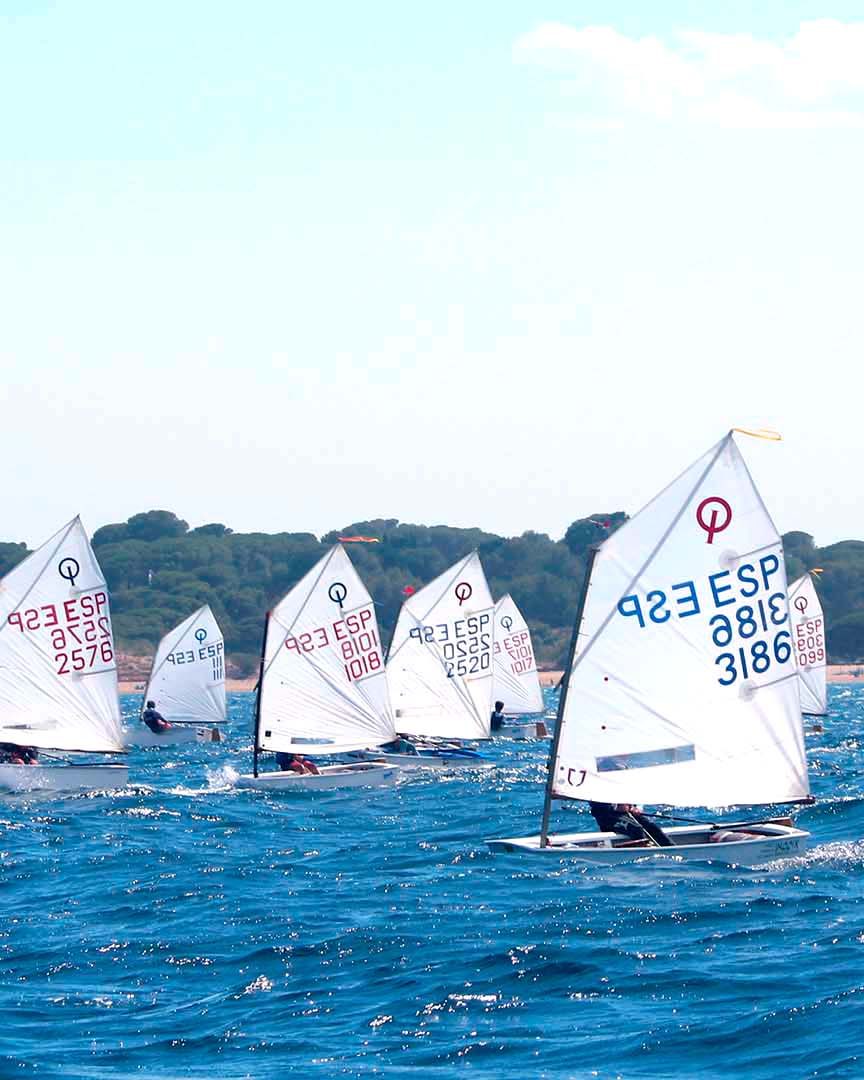 Optimist fleet on the water