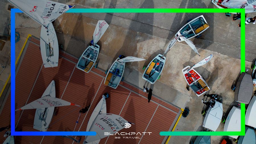 Aerial view of Optimist and ILCA fleet — BE TRAVEL